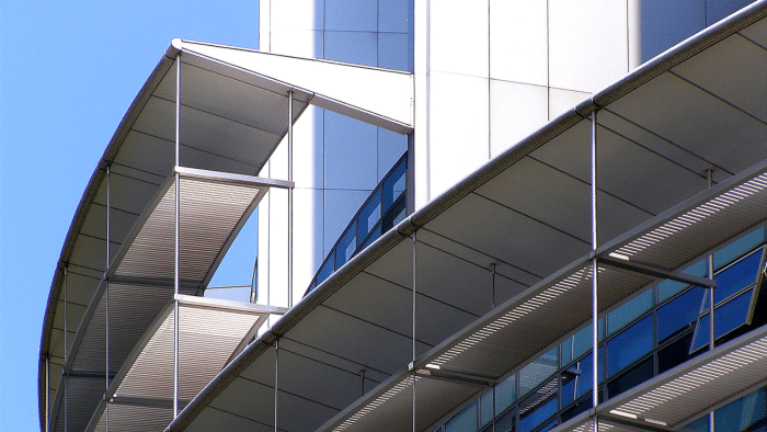 Outside of a building wall with many windows