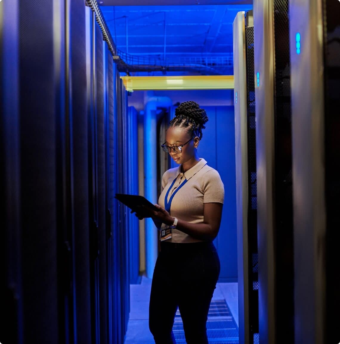 Woman using a tablet in a hallway