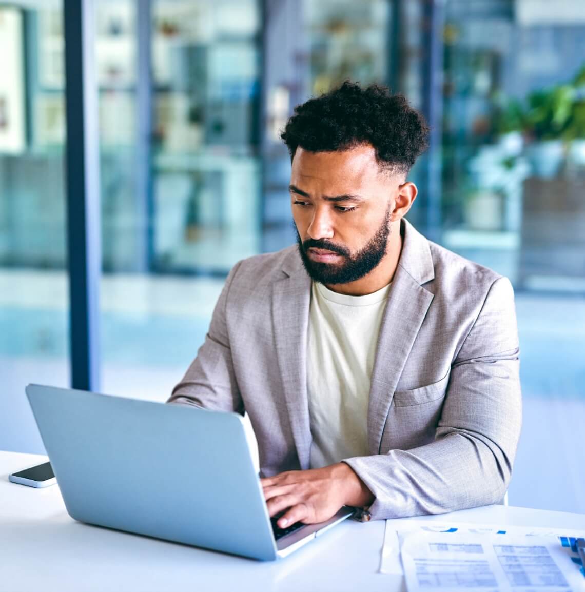 Man working on his laptop in the office