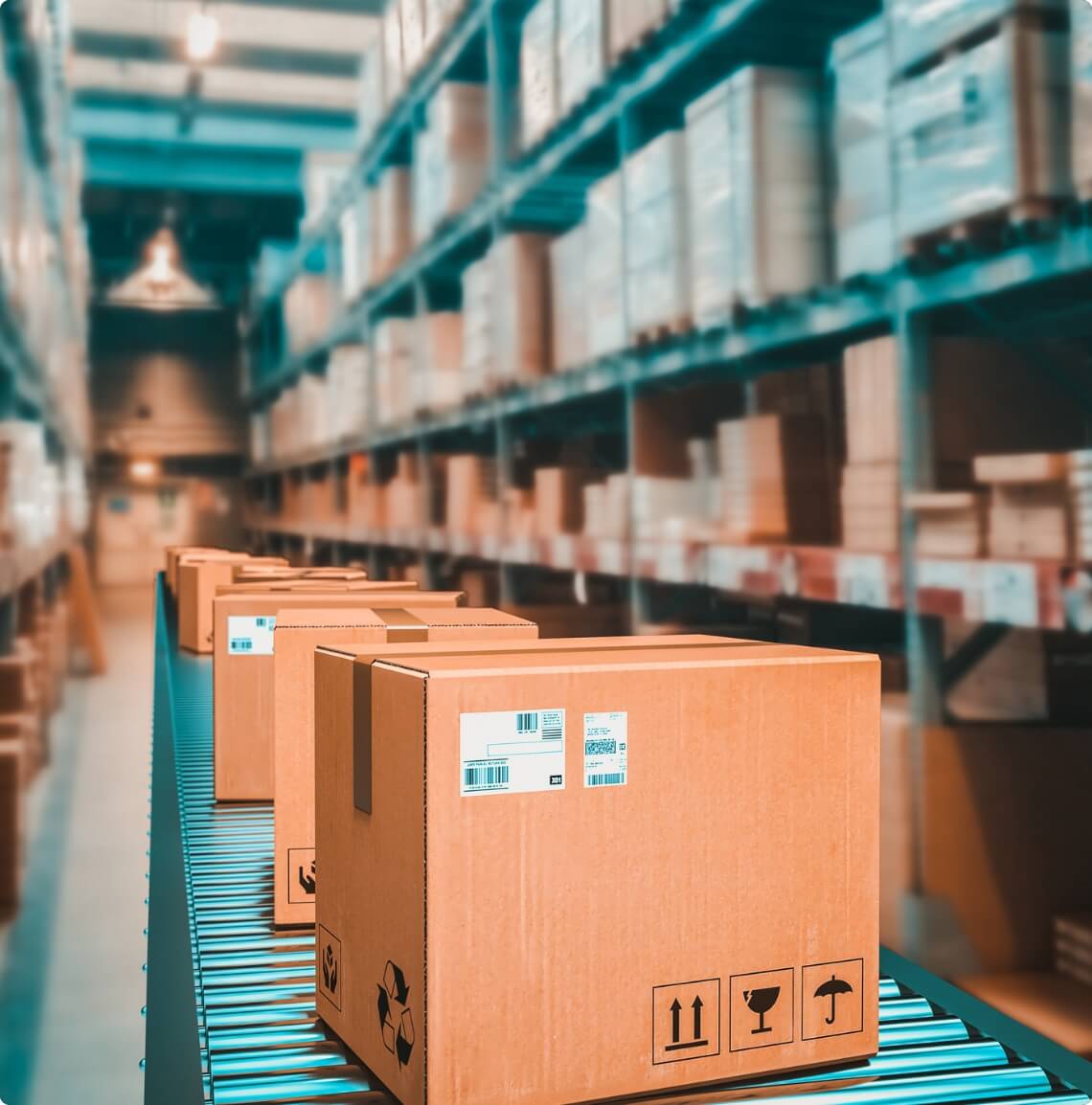 Boxes on a conveyor belt in a warehouse