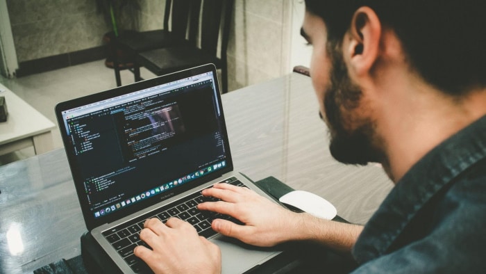 Man working on laptop at the office