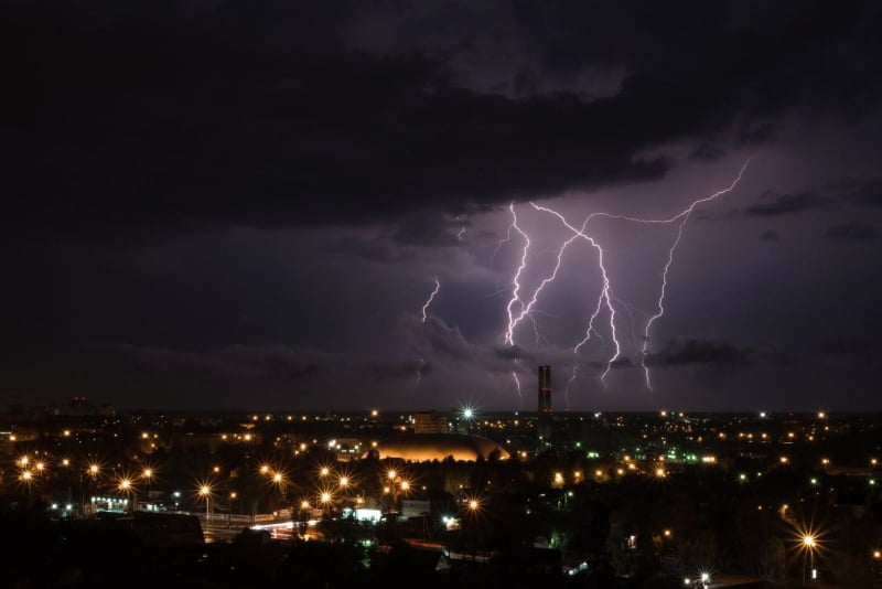 Nighttime lightening storm over a city
